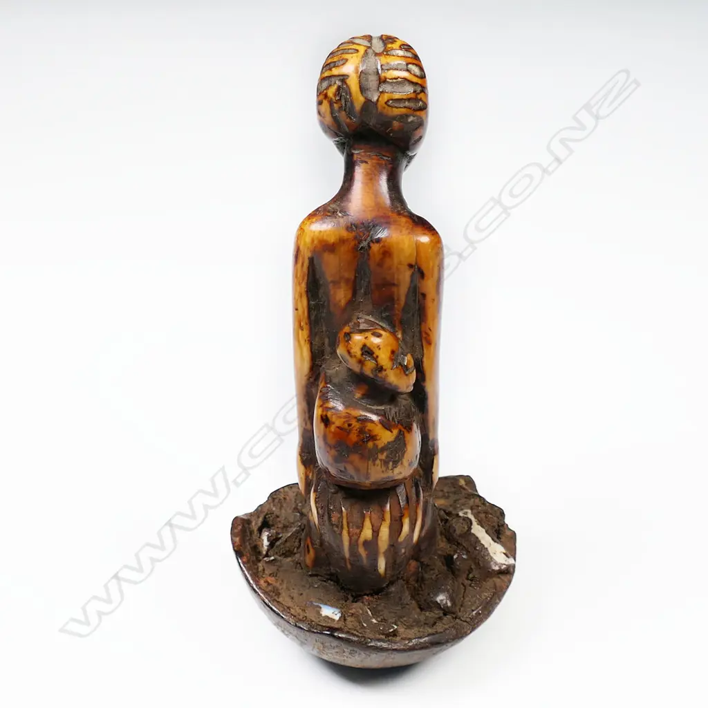 An African carved ivory fetish figural pestle, Image 1++